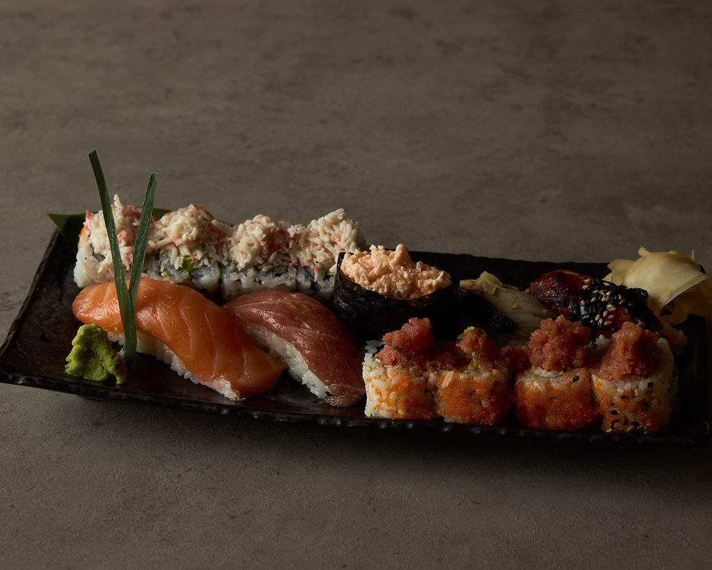 Tokyo Lush Roll plated elegantly with sauce drizzle